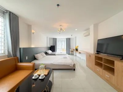 Deluxe King Studio — Quynh Khang Hotel & Apartment - Khách Sạn tại Quận 4, TPHCM